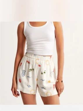Abercrombie & Fitch White Shorts with Red, Blue, Green & Gold Motif